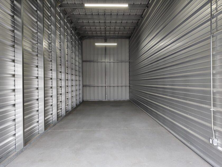 warehouse-space-for-rent empty commercial storage unit with lights and power